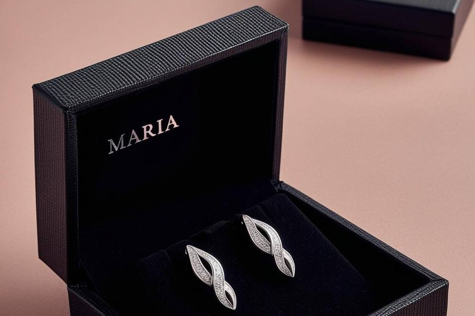 Pendientes infinito oro blanco