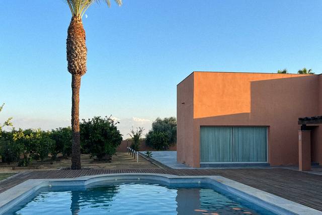 Piscina y Jardines
