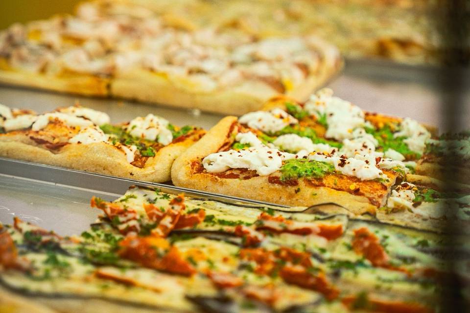 Deliciosas porciones de pizza