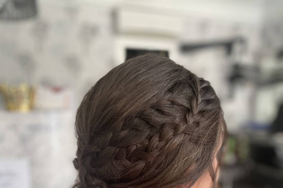 Recogido pulido con trenza