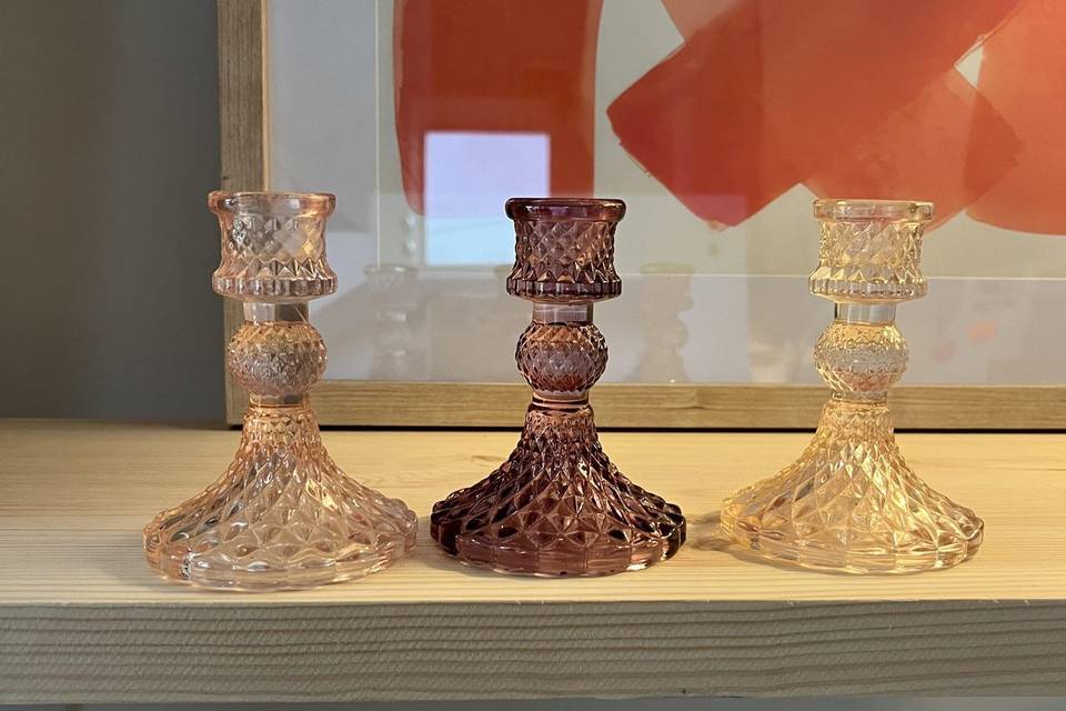 Candelabros en rosa y malva