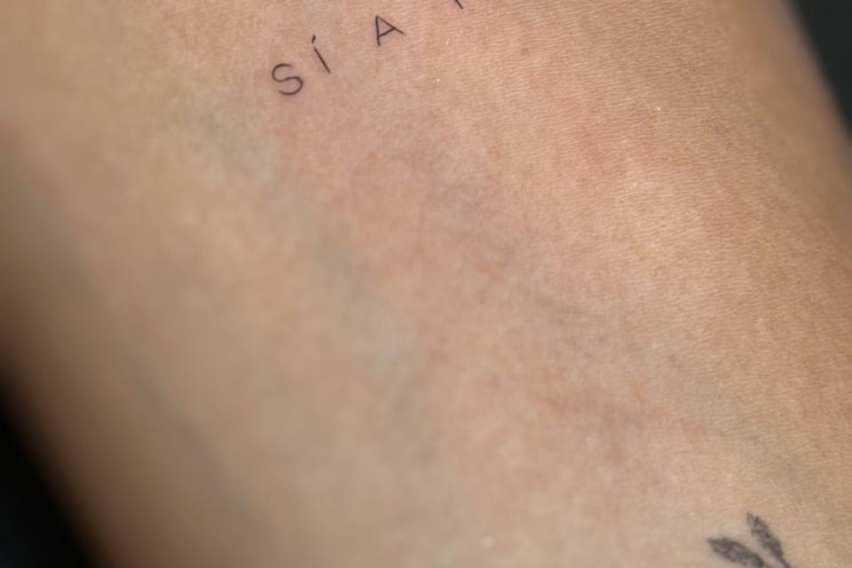 Frase en brazo