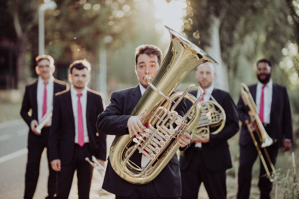 Among Brass