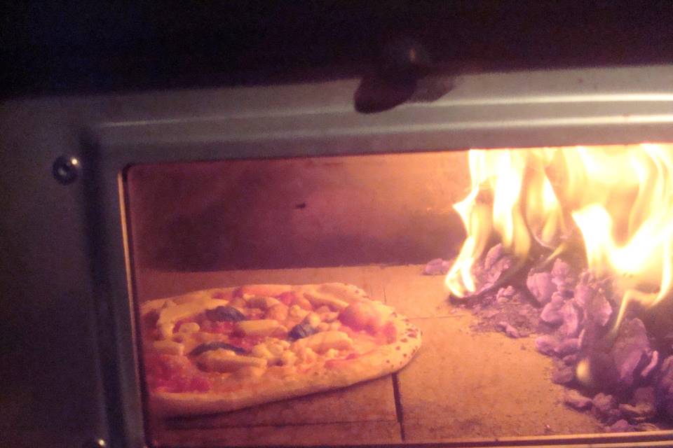 Horneando las pizzas a 450ºC
